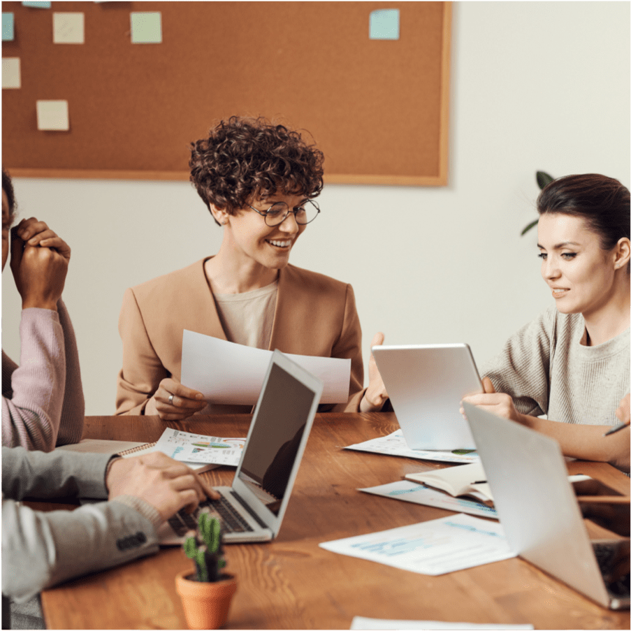 Team of people working in a meeting room