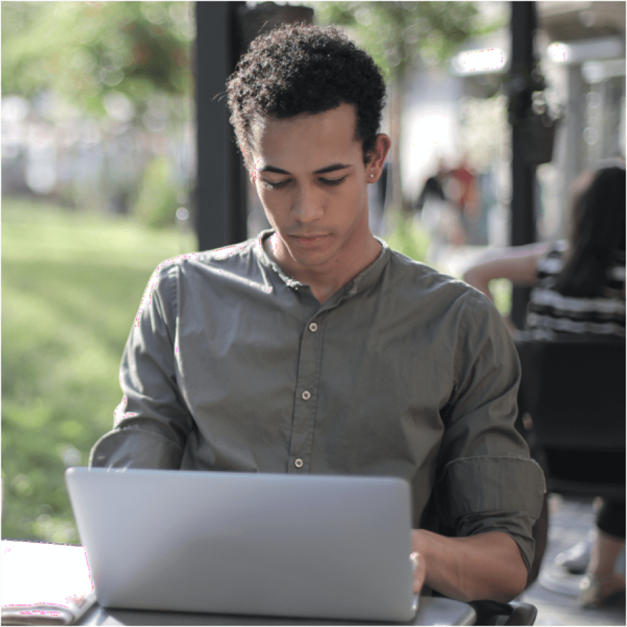 Man with a laptop outdoors