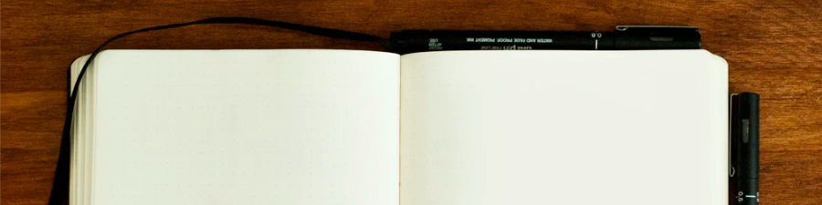 writer notebook pen upsplash