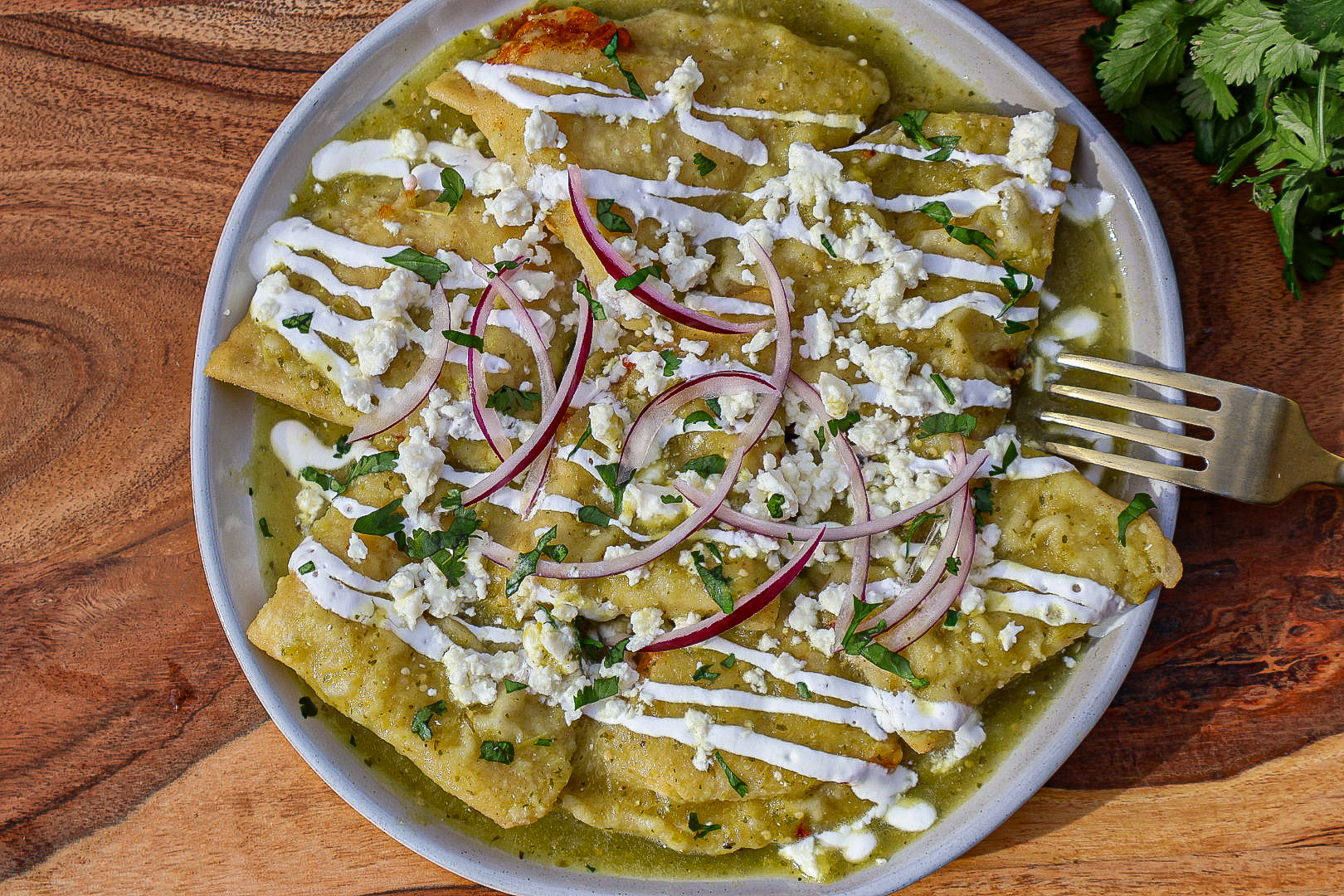 Cheese stuffed green chilaquiles