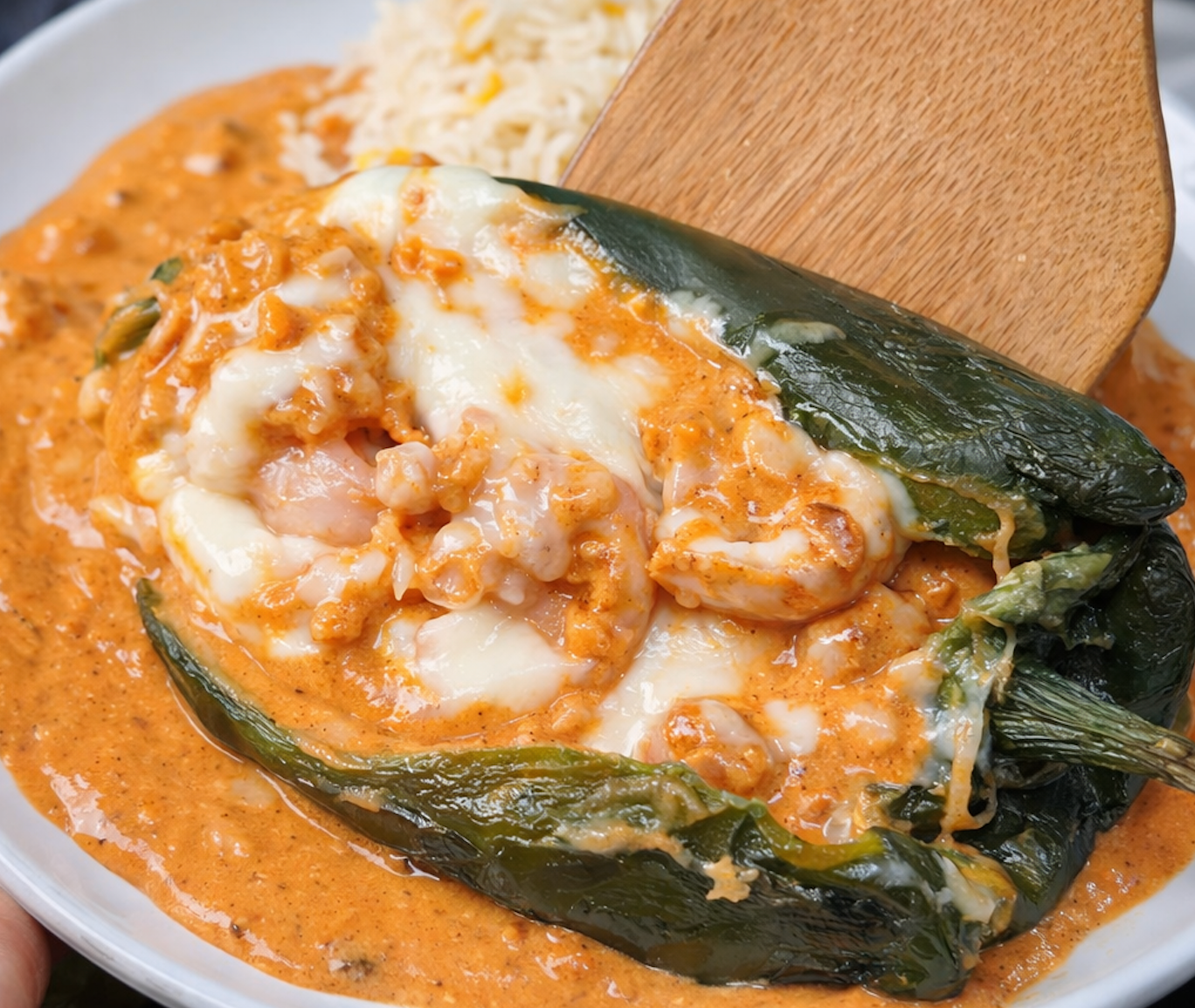 Shrimp stuffed poblano peppers with creamy chipotle sauce