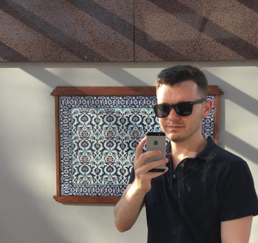 Fatih Bilgic's headshot - a person taking a selfie 