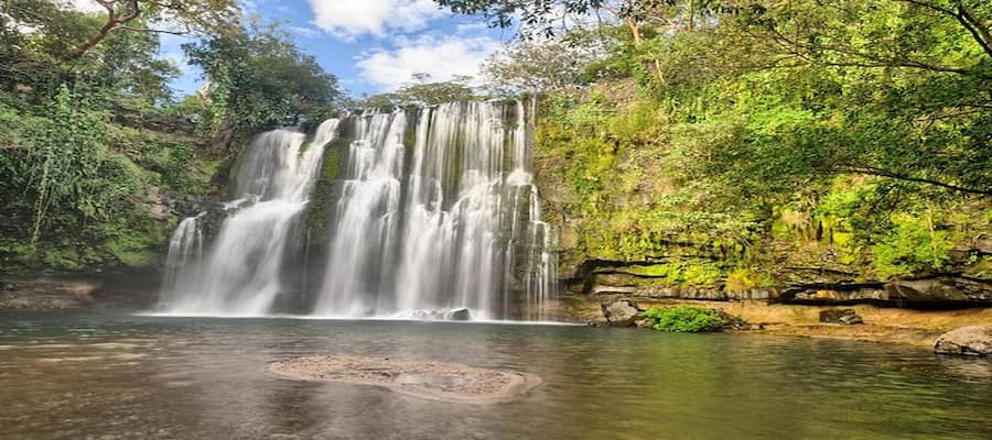 LLANOS DE CORTEZ WATERFALL IN COSTA RICA