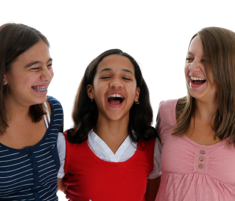teen girls laughing