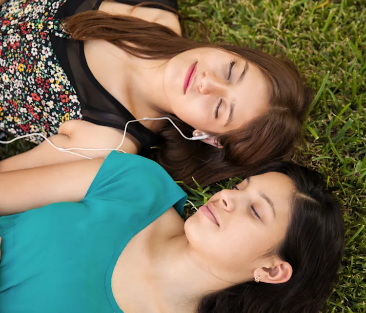 Girls relaxing in a park