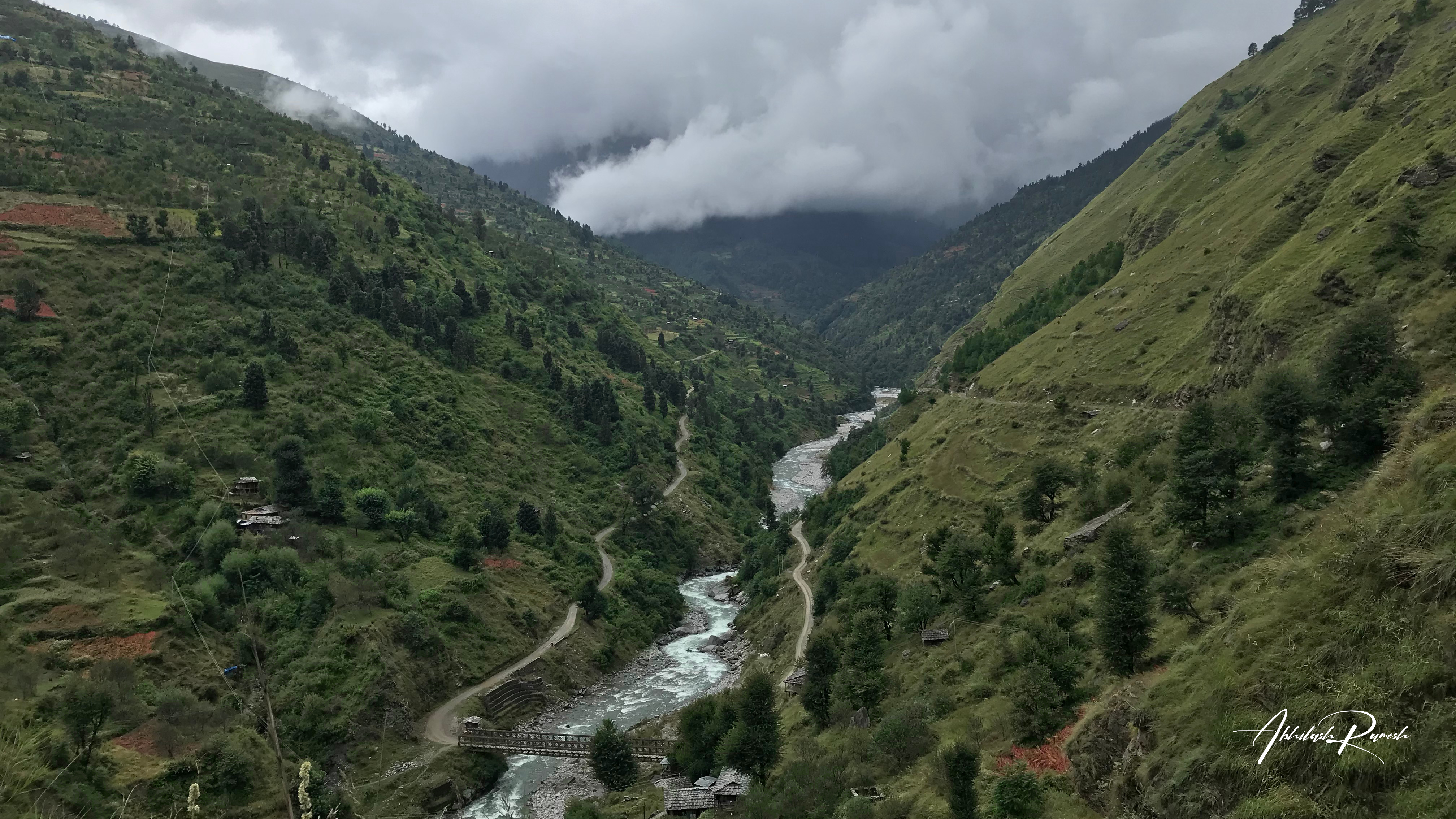 Another view of a valley overlooking from the top of a mountain