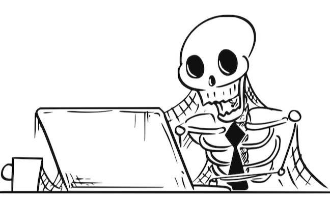 Shutterstock - skeleton using cobwebbed computer