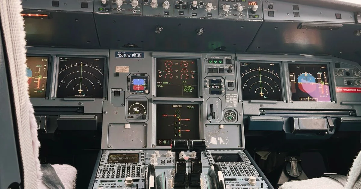 The instrument-filled flight deck of a modern airliner, dense with screens and controls.  (source: https://images.pexels.com/photos/19576657/pexels-photo-19576657.jpeg)