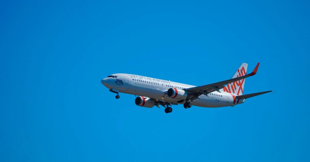 A passenger jet cruises overhead against a cloudless, bright blue sky.  (source: https://images.pexels.com/photos/30079459/pexels-photo-30079459.jpeg)