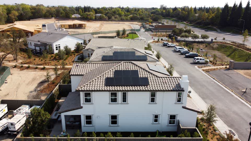 Solar panels from SunPower are installed on residential buildings at a model home display in the Eureka Grove neighborhood of Granite Bay, California, U.S., October 5, 2021.