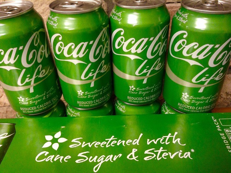 Image of Coca-Cola Life drink cans - green and 'natural'