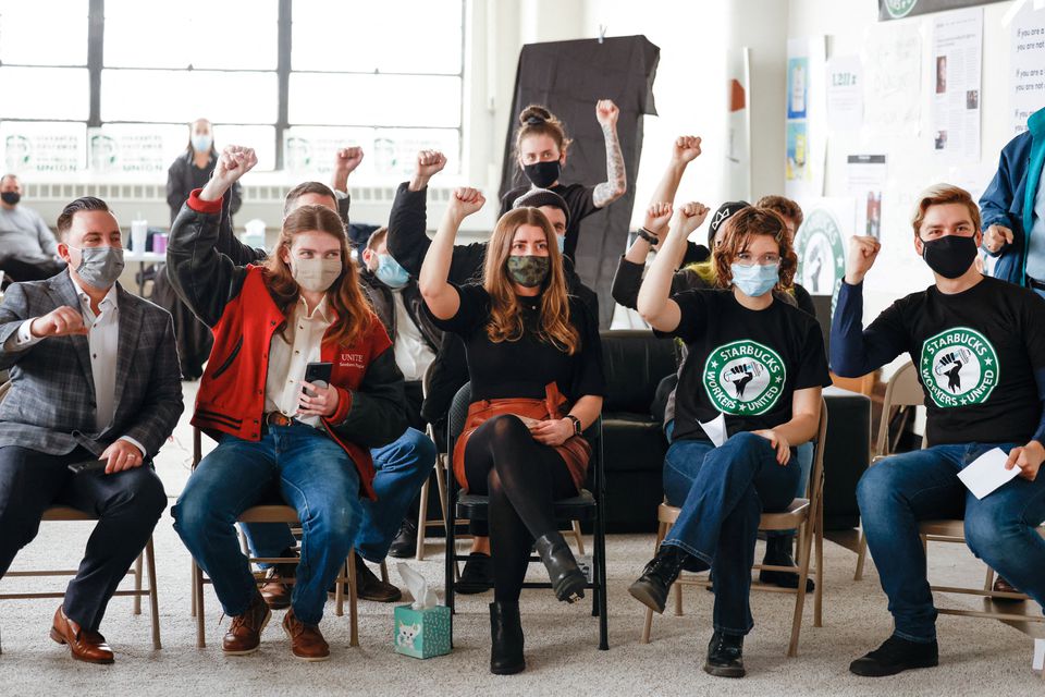 Members react during Starbucks union vote in Buffalo, New York, U.S., December 9, 2021.
