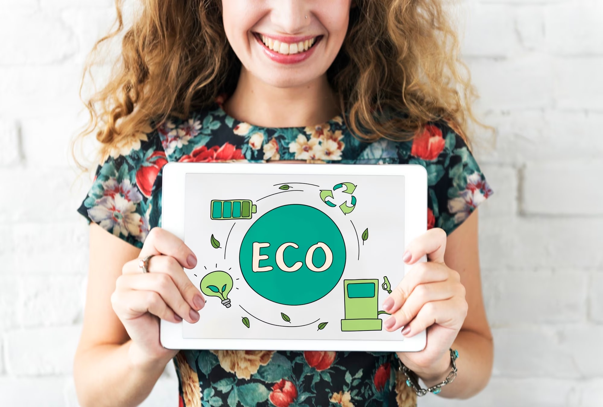 Image of caucasian woman holding a graphic with eco process