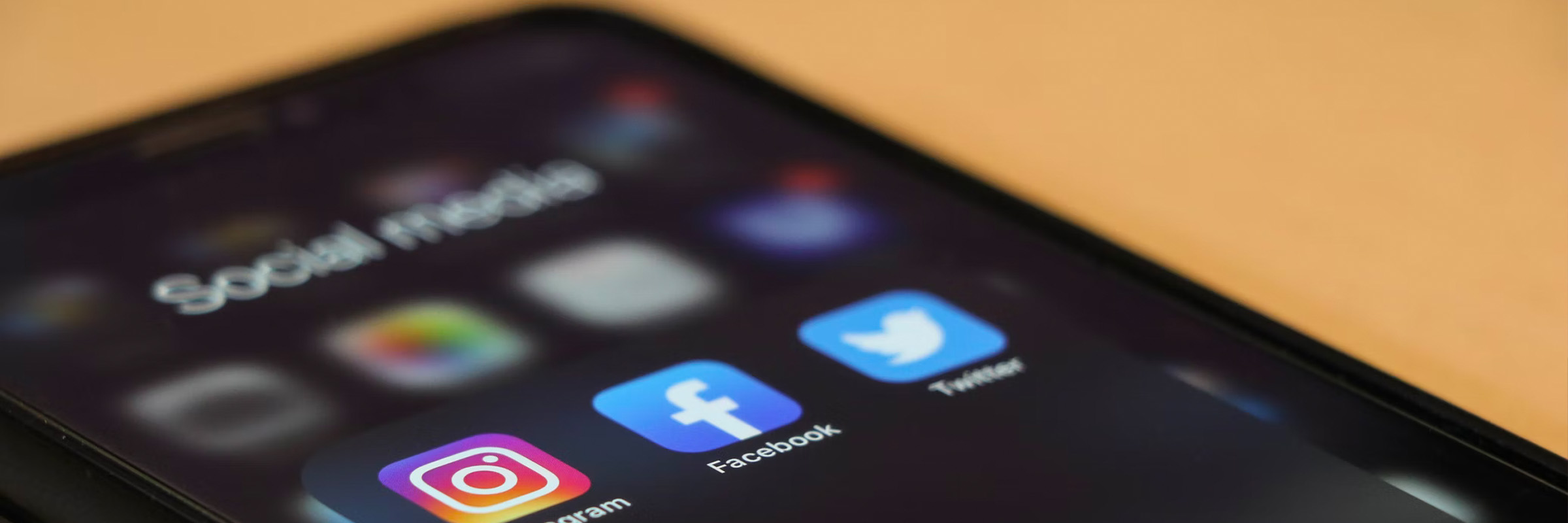 Phone screen with social media icons