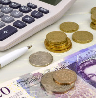 United Kingdom pound sterling and calculator representing the finance an SME could get with a business loan