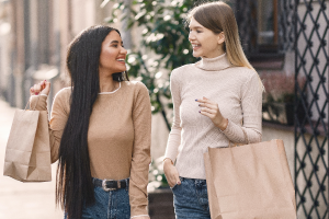 women shopping carrying shopping bags