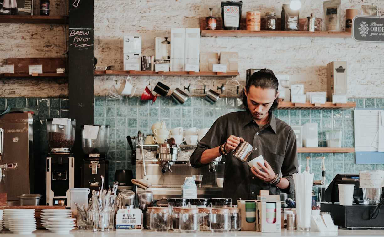 Barista making coffee