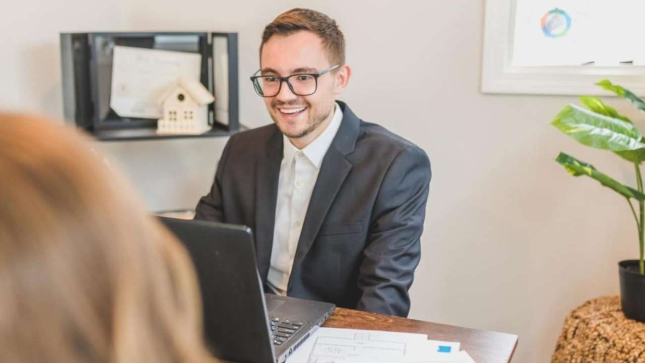 Mortgage broker at his desk