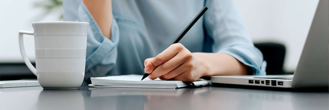 SME director filling out a small business loan application