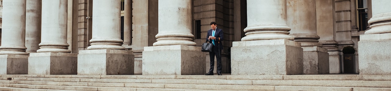 Man on steps on Bank of England