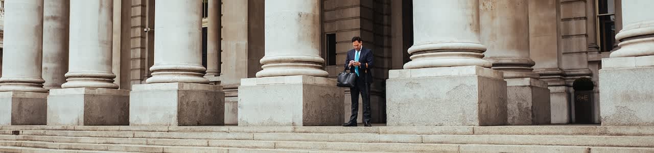 Man on steps on Bank of England
