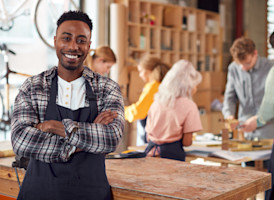 portrait-of-small-business-owner-in-workshop-assem-2023-11-27-05-04-46-utc