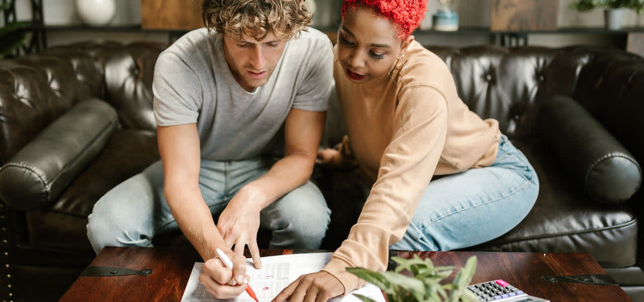 Couple filling in application forms 