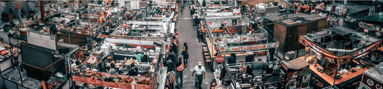 People in warehouse packing boxes