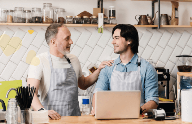 Valentine's Day image of two men in coffee shop working