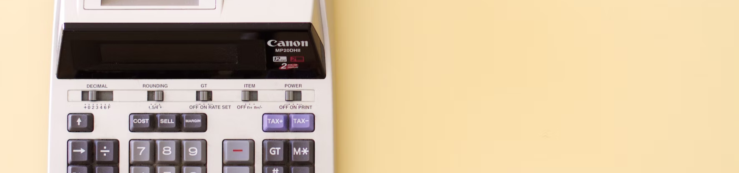 calculator on yellow background