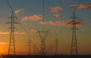 Power pylons at sunset