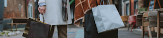 Women shopping holding shopping bags