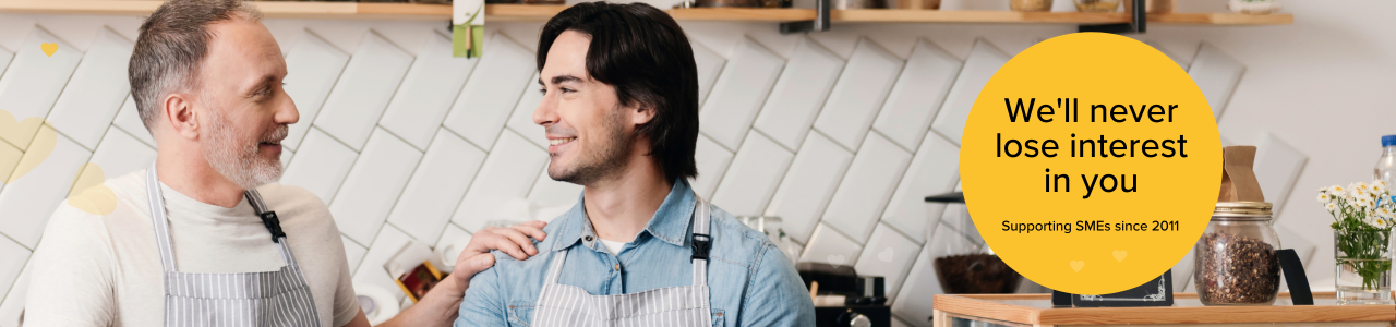 Valentine's Day image of two men in coffee shop working