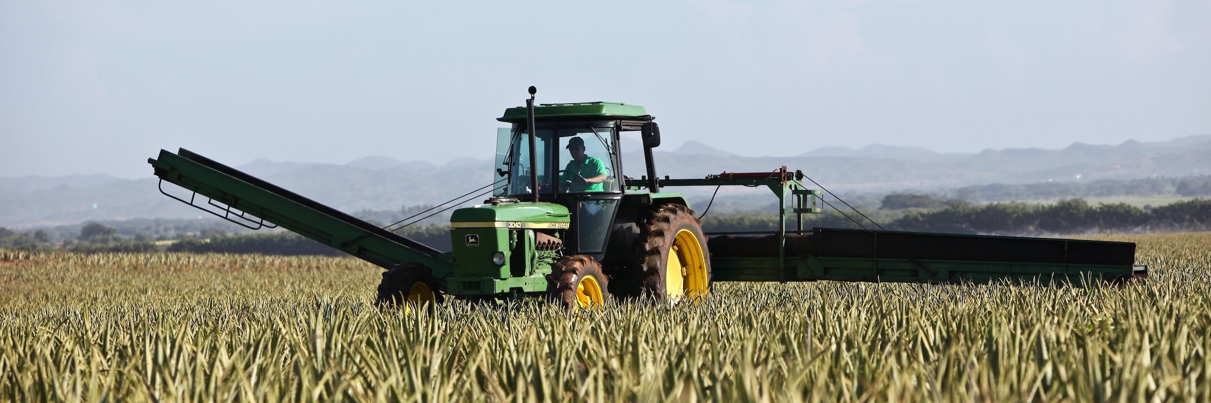 person riding tractor