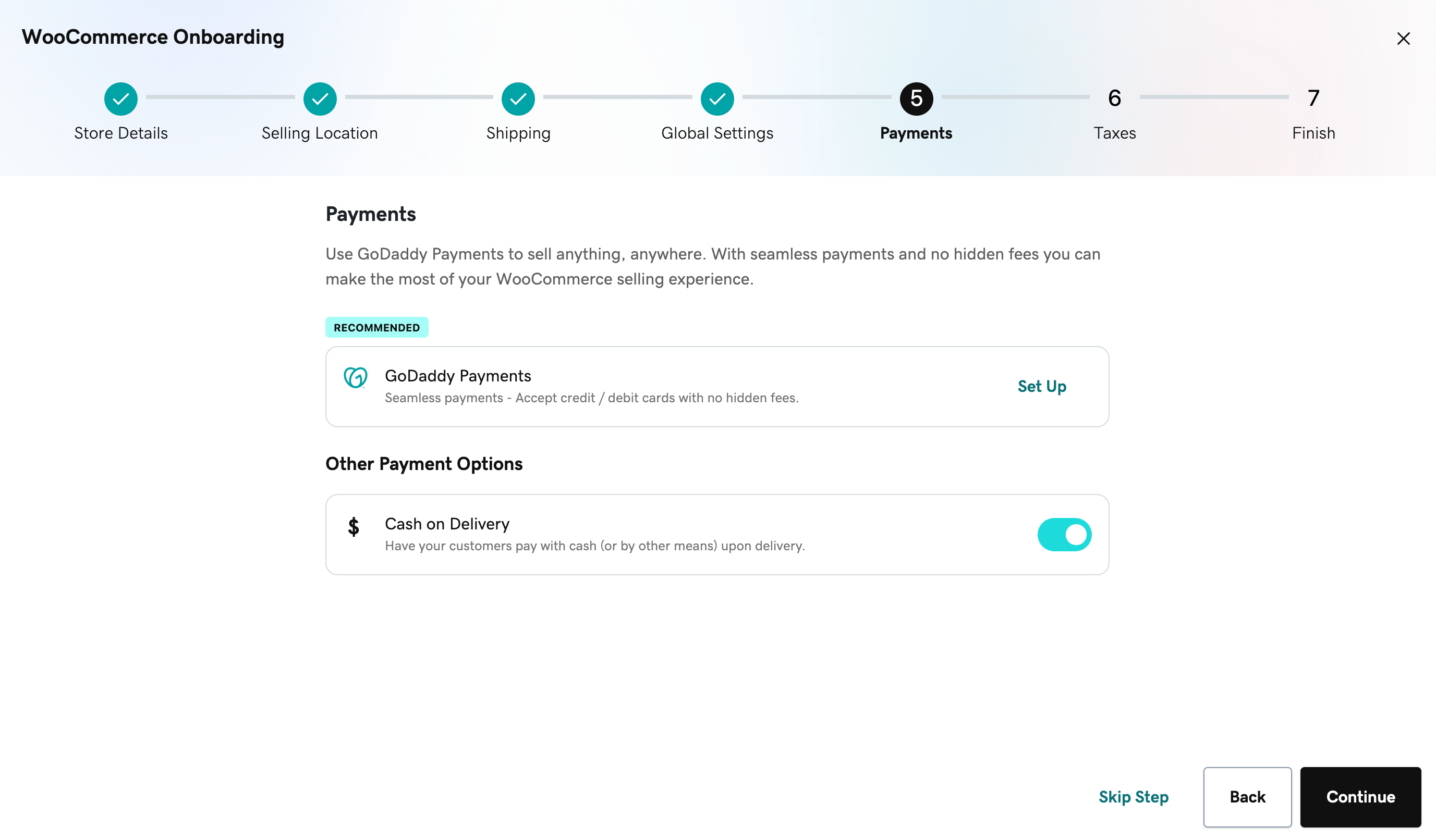 Two fields that allow merchants set up a GoDaddy Payments account and cash on delivery during the onboarding wizard