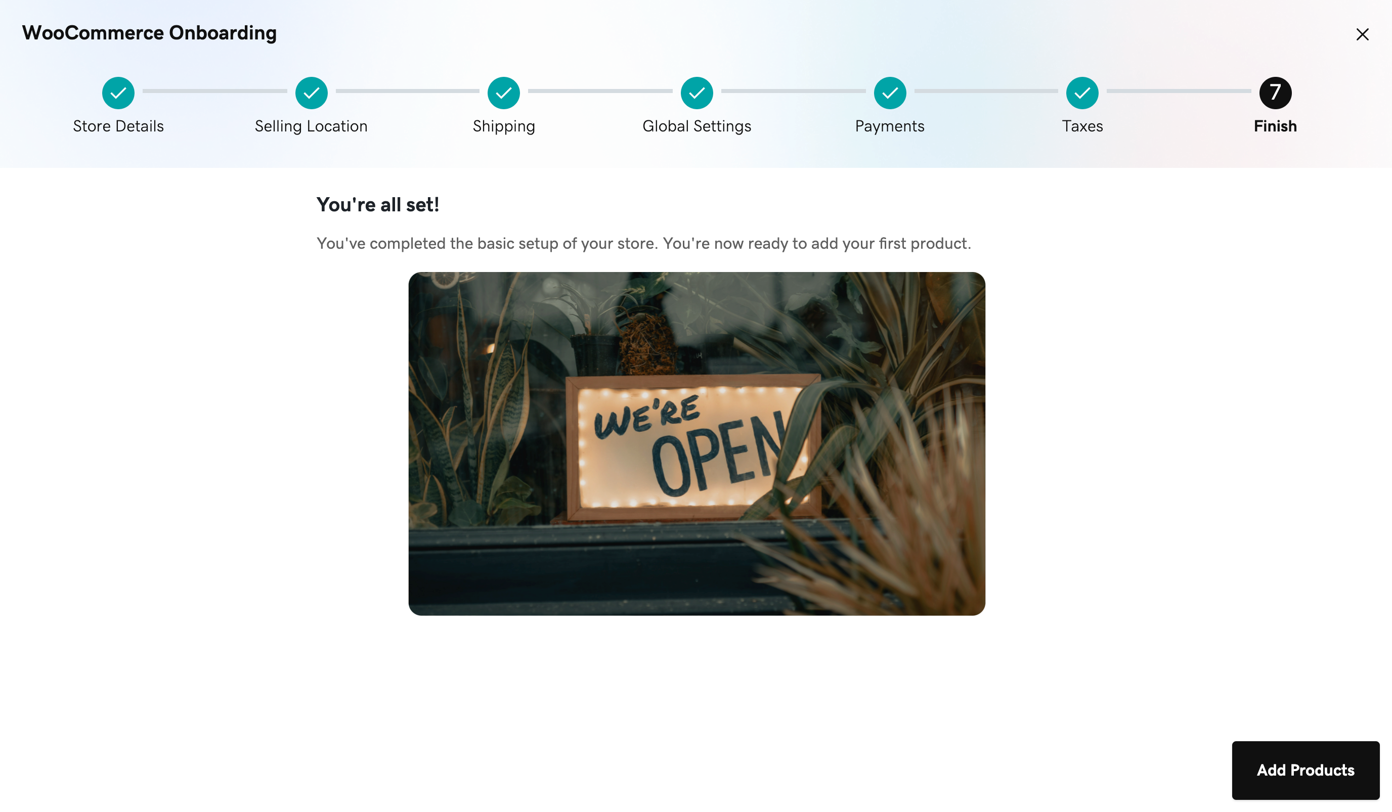 Last page of the onboarding wizard that includes a we're open picture and an add products button on the lower right corner