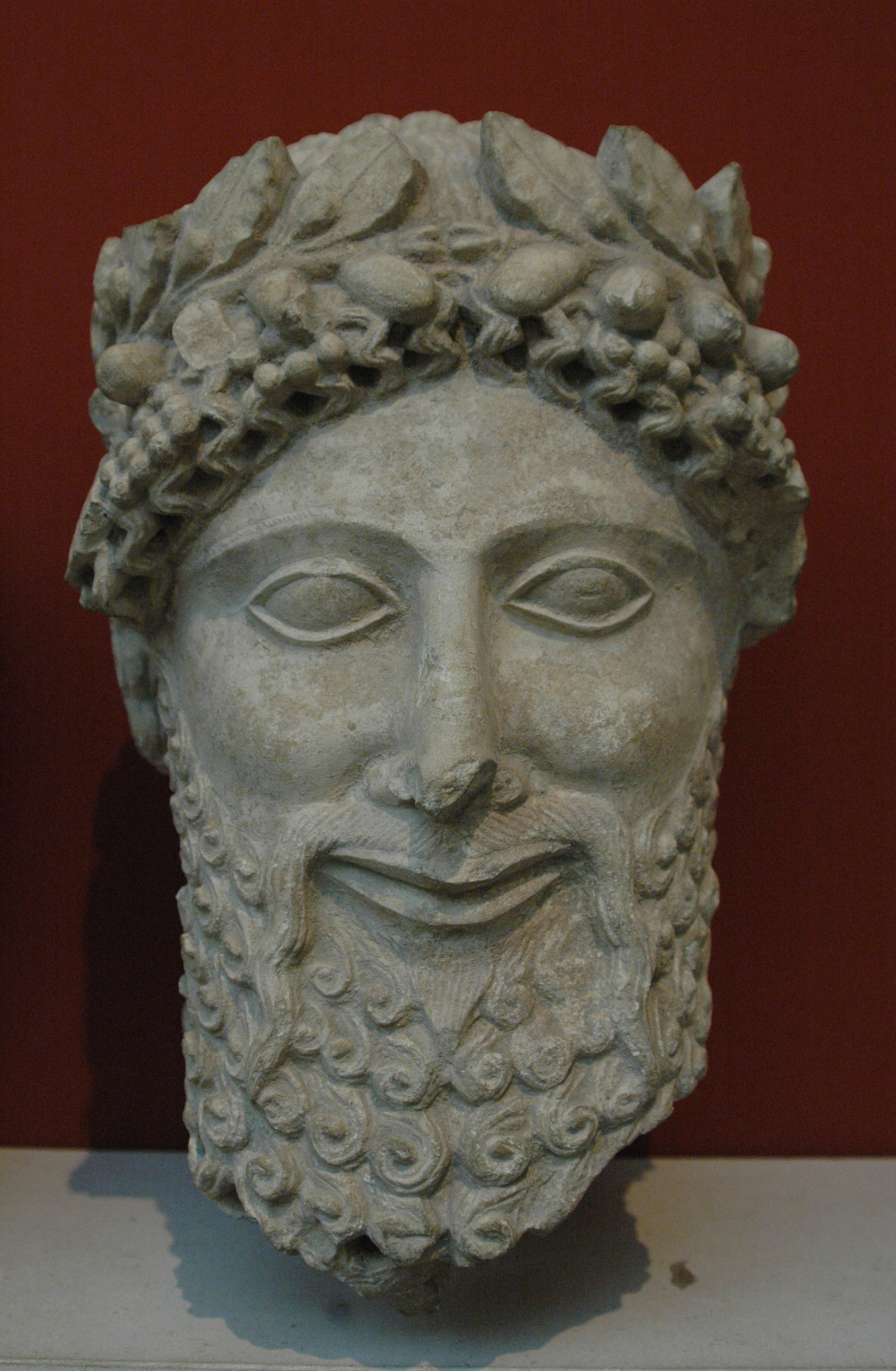 Limestone head from a statue of a bearded worshipper from the Sanctuary of Apollo at Idalion, showing the kind of votive sculpture known from Cypriot Apollo sanctuaries. Credit: Carole Raddato, Wikimedia Commons/Flickr, CC BY 2.0