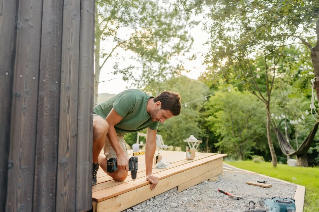 Man building deck. 