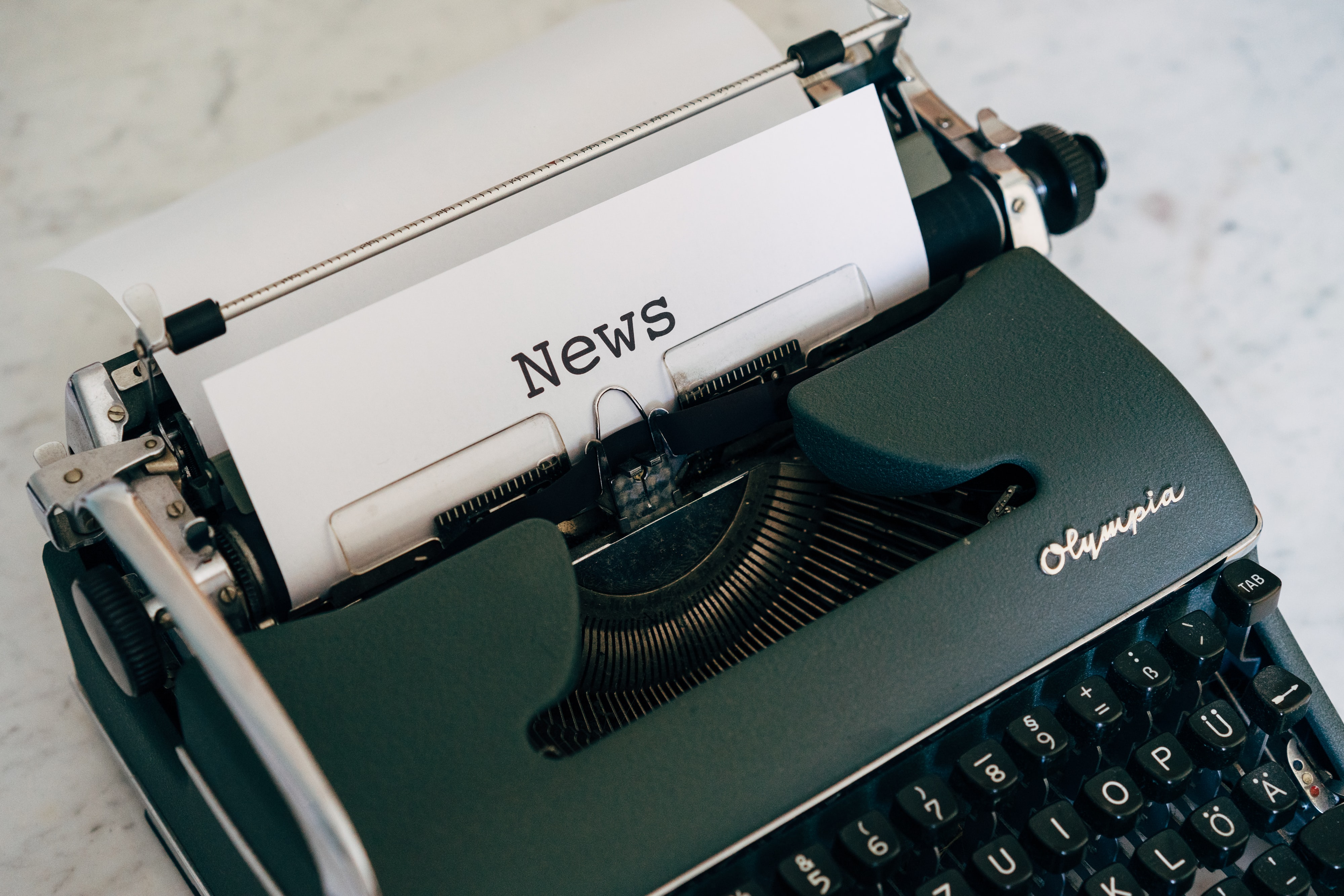 Typewriter with the headline 