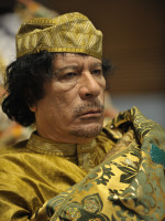 U.S. Navy photo by Mass Communication Specialist 2nd Class Jesse B. Awalt/Released, Public domain, via Wikimedia Commons Muammar Gaddafi