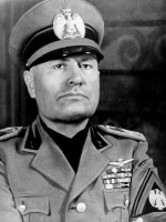Original author unknown. Derivation from colorized version. Public Domain, Italy. See Template:PD-Italy/US., CC0, via Wikimedia Commons Benito Mussolini
