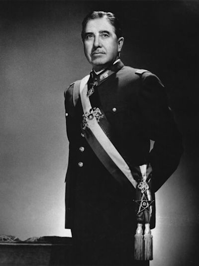Ministerio de Relaciones Exteriores de Chile., CC BY 2.0 CL <https://creativecommons.org/licenses/by/2.0/cl/deed.en>, via Wikimedia Commons Augusto Pinochet