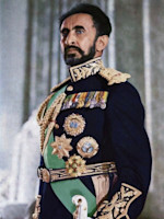 author unknown; an official portrait of which b/w copies were distributed by the Ethiopian government, Public domain, via Wikimedia Commons Haile Selassie