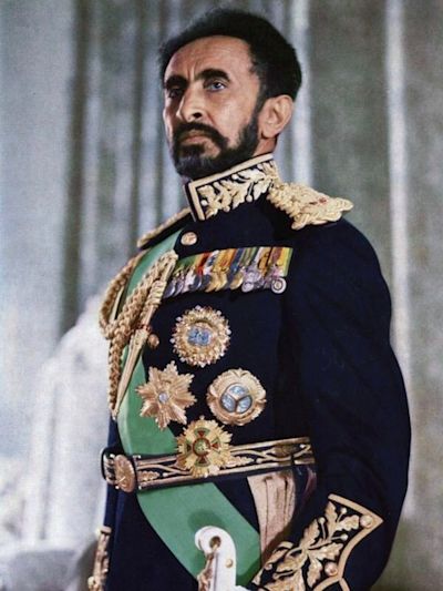 author unknown; an official portrait of which b/w copies were distributed by the Ethiopian government, Public domain, via Wikimedia Commons Haile Selassie