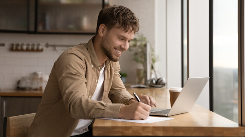 Man working as part of a hybrid workforce