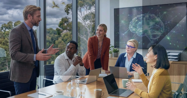 A group of Educators and teachers meeting to discuss issues in a boardroom. 
