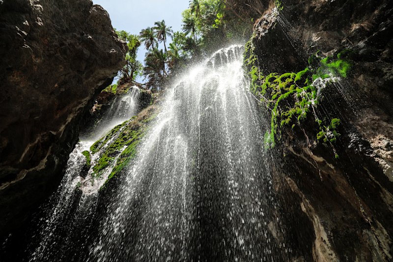 lookin gup at Ngero Sera Waterfall