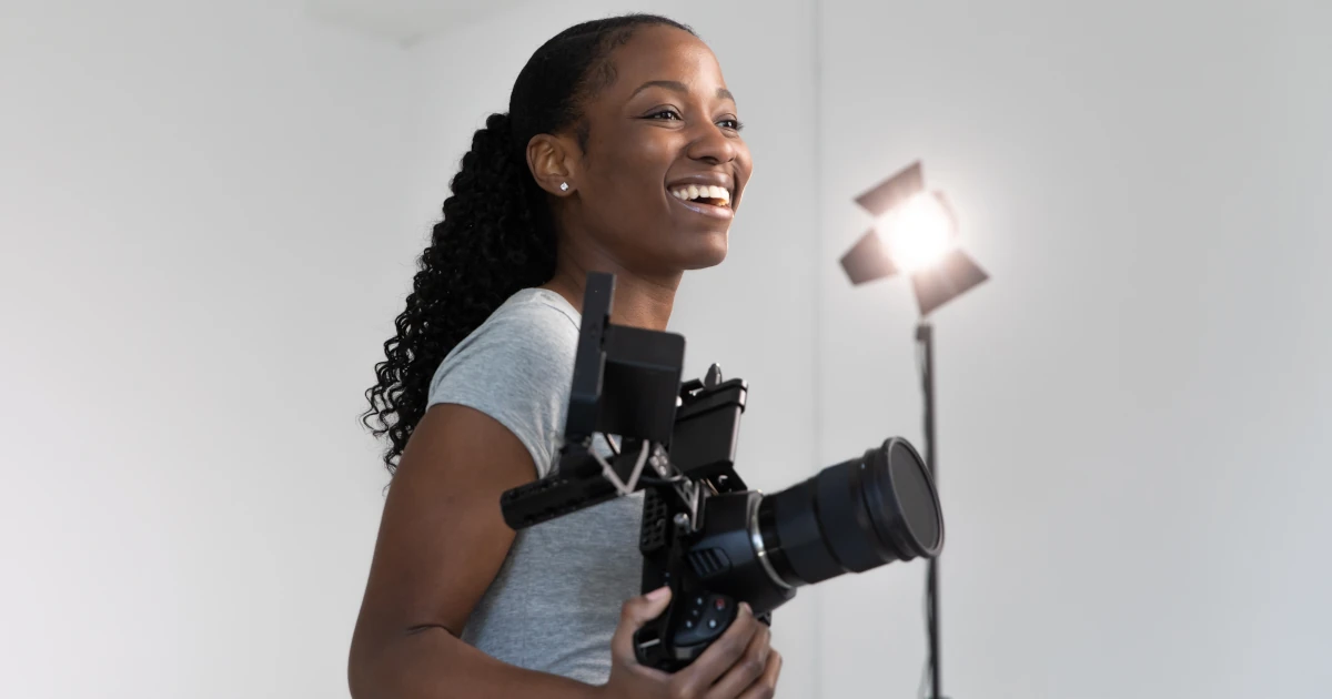 A female videographer on a job | Swyft Filings