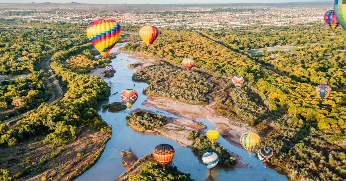 Hot air balloons over the Rio Grande river in New Mexico | Swyft Filings
