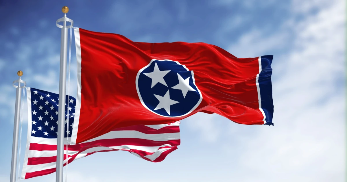 The Tennessee state flag waving along with the national flag